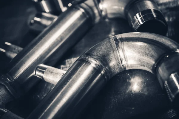 welded-stainless-steel-pipes-close-up-2025-03-28-09-49-43-utc-scaled